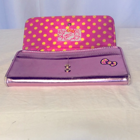 HELLO KITTY metallic pink wallet. Holds up to 16 cards. Polka dot lining inside. - Picture 12 of 16